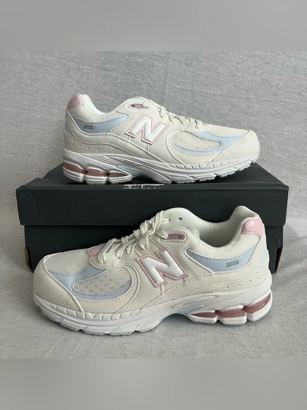 New Balance 2002 White Leather Sneakers with Pale Pink & Light Blue Accents